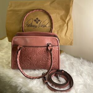 PATRICIA NASH PARIS tooled OLD ROSE SATCHEL. Note- scuff marks on bottom and ink